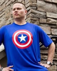 tephen Box after weight loss, standing confidently in a Captain America t-shirt